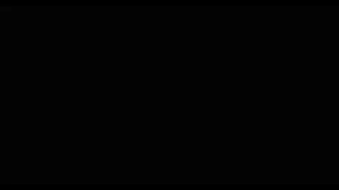 A flashing studio spotlight with a cool white beam illuminating a dark room Stock Footage 326197770