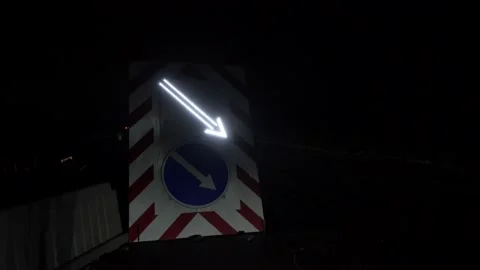 Flashing warning lights at road repairs. Signs to detour. Entrance or road is Stock Footage 167120307