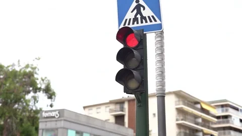 Flashing yellow traffic light close-up on the streets of Europe. Stock Footage 266151493