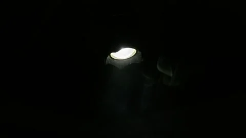 Flashlight Beam Cutting Through Swirling Smoke in Pitch Black Night Stock Footage 345169006