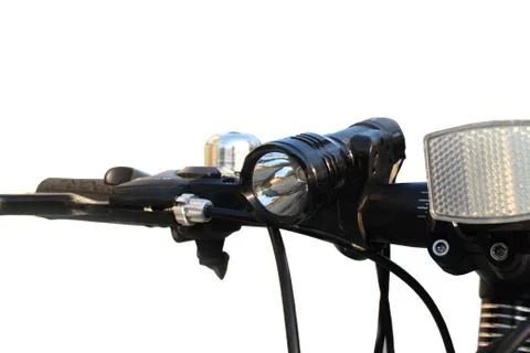 Flashlight on bicycle hands Stock Photos