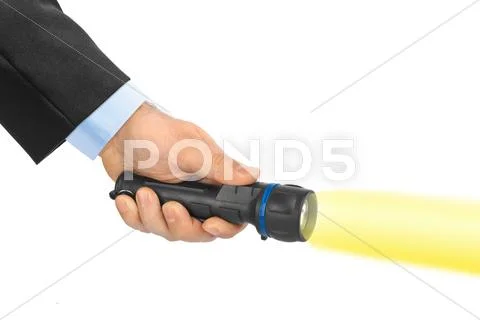 Flashlight in hand Stock Photos