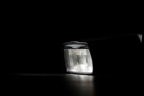 Flashlight head on black background in low key light Stock Photos