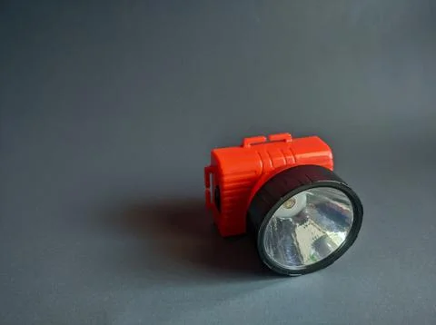 A flashlight isolated over gray background Stock Photos