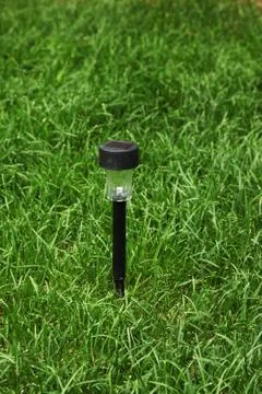 Flashlight park on the green grass Foto stock