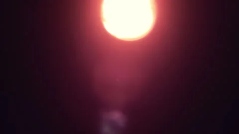 Flashlight shining in camera backlit lens flare light leak overlay background Stock Footage 287068345