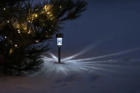 Flashlight in the snow Stock Photos