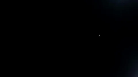 Flashlights bright beam sparkle on black background Stock Footage 104546627