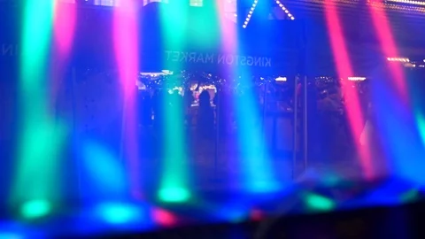 Flasing Christmas lights reflects in window at old town square market 4K Stock Footage 116135745