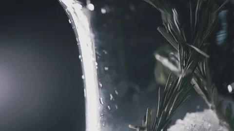 In the flask for the hookah are put mint leaves Stock Footage