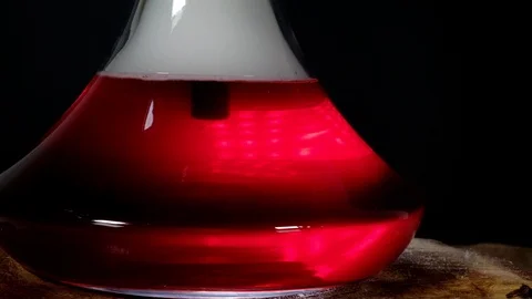 The flask hookah with a colored bubbling water in action Stock Footage 124970840