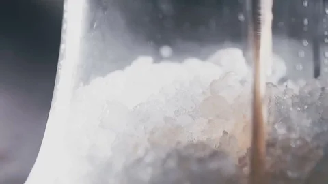 In the flask for hookah is poured cola Stock Footage 77348541