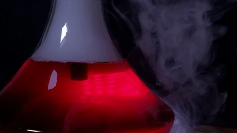 The flask hookah with red water a lot of smoke Stock Footage 124970859