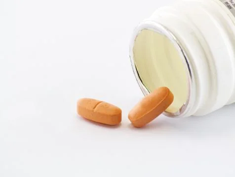 Flask of pills Stock Photos