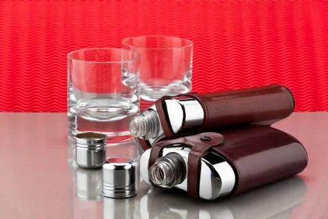 Flasks and empty glasses Stock Photos