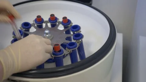Flasks with a blood test in a centrifuge Stock Footage 72997757