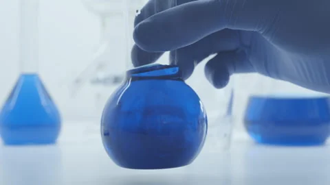The flasks with blue liquid.  Stock Footage 248222608