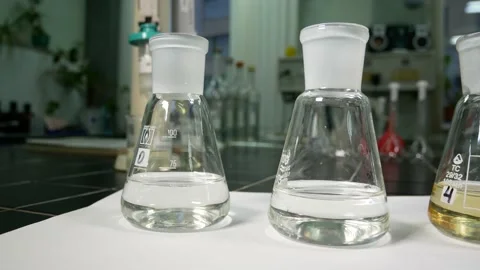 Flasks with liquid in a chemical laboratory Stock Footage 166986022