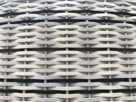 Flat black and white plastic long lines weave as pattern wicker Stock Photos