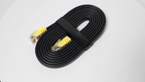 Flat black network cable on a white background. LAN cable. Stock Footage 219114365