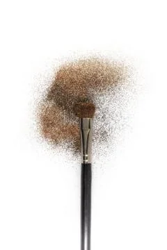 Flat blush brush with blush on it, loose powder and glitter blush, isolated. Фото