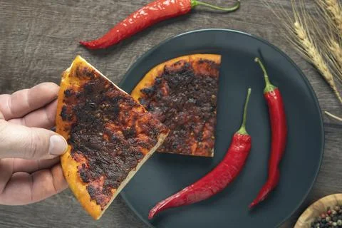 Flat bread  baked with Hot and spicy paprika on top. Stock Photos