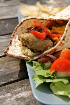 Flat bread with falafel and hummus Stock Photos