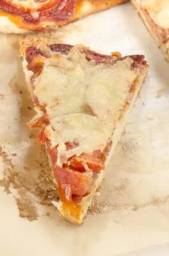 Flat bread pizza with tomato and salami Stock Photos