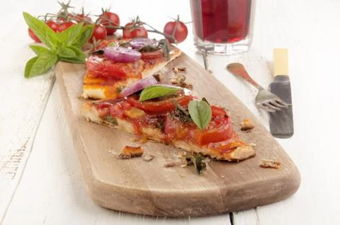 Flat bread pizza with tomato Stock Photos