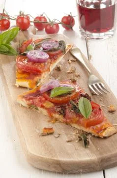 Flat bread pizza with tomato Stock Photos