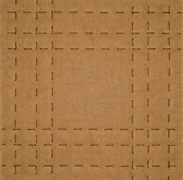 Flat brown cardboard  background texture with perforated lines that will help Stock Photos