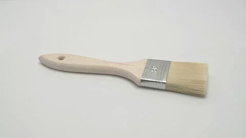 Flat brush rotates on a white background. Видео 267009572