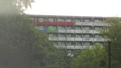 Flat Building With Red, With A Green Foreground On A Sunny Day In Amsterdam Video stock 126700936