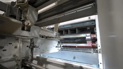 Flat cardboard sheets move at high speed along conveyor belt Stock Footage 296577463