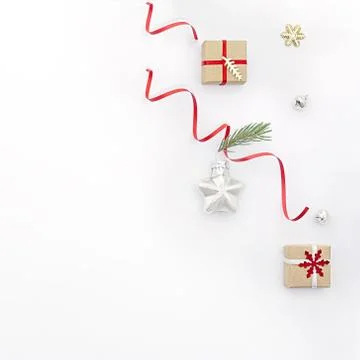 Flat christmas composition on white background with holiday gift boxes, star  Stock Photos