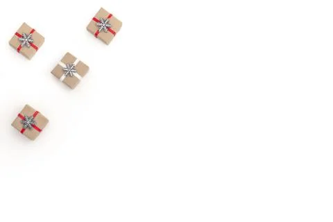 Flat christmas composition on white background with holiday boxes decorated w Stock Photos