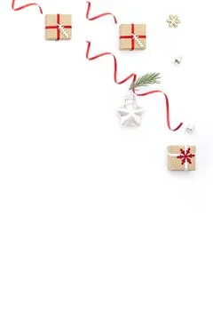 Flat christmas composition on white background with holiday gift boxes, star  Stock Photos