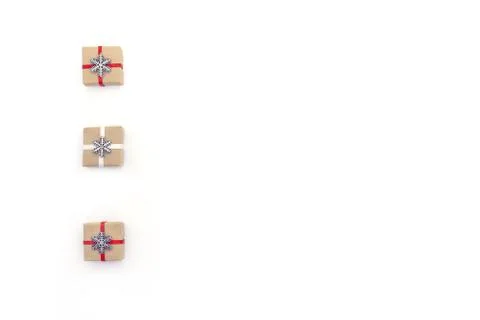 Flat christmas composition on white background with holiday boxes decorated w Stock Photos