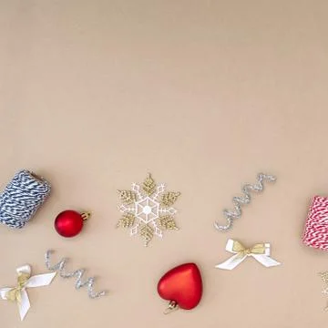 Flat composition of Christmas decorations in red, white, gold and silver on a Stock Photos