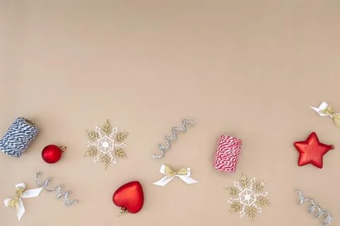 Flat composition of Christmas decorations in red, white, gold and silver on a Stock Photos