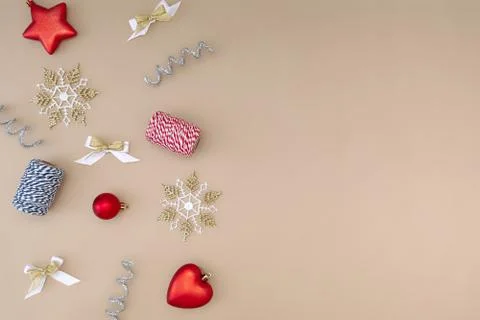 Flat composition of Christmas decorations in red, white, gold and silver on a Stock Photos