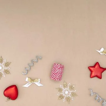 Flat composition of Christmas decorations in red, white, gold and silver on a Stock Photos