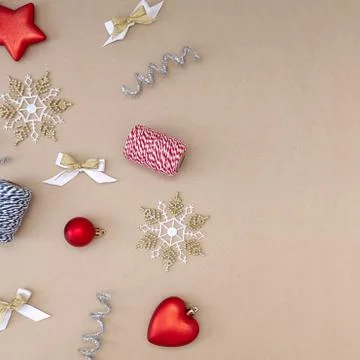 Flat composition of Christmas decorations in red, white, gold and silver on a Stock Photos