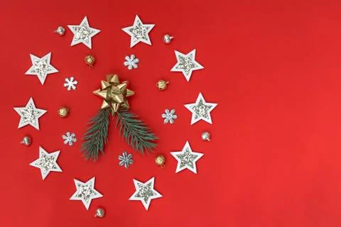 Flat composition of Christmas decorations in white and gold and fir branches on Stock Photos