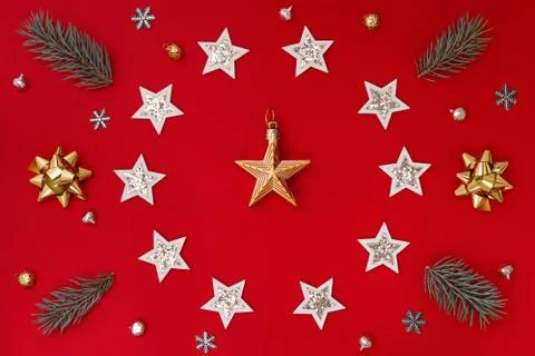 Flat composition of Christmas decorations in white and gold and fir branches  Stock Photos