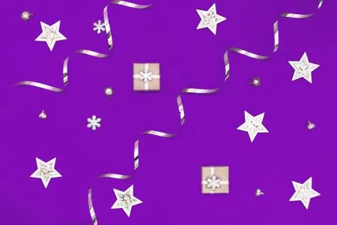 Flat composition of Christmas decorations in white and silver on a purple bac Stock Photos