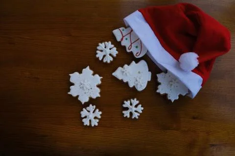 Flat composition christmas hat and new year gingerbread. Merry Christmas Stock Photos