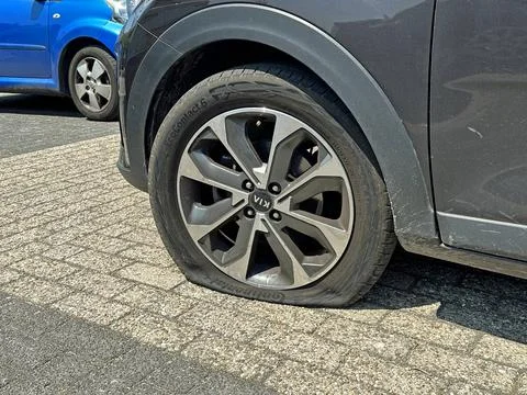 Flat Continental EcoContact 6 front tire Stock Photos