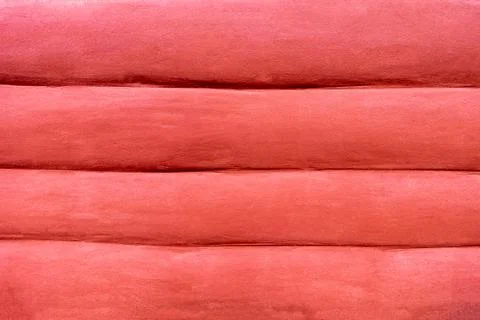 Flat deep red chili pepper color plaster wall matte texture Stock Photos