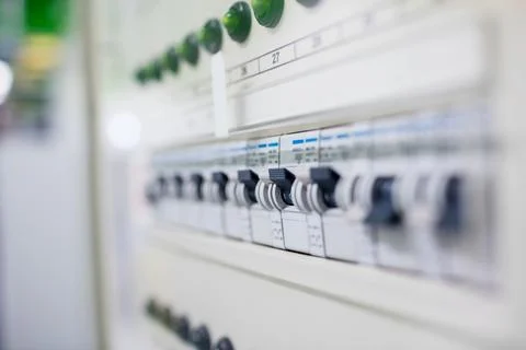 Flat design circuit breaker panel is showcasing toggle switches with printed Stock Photos